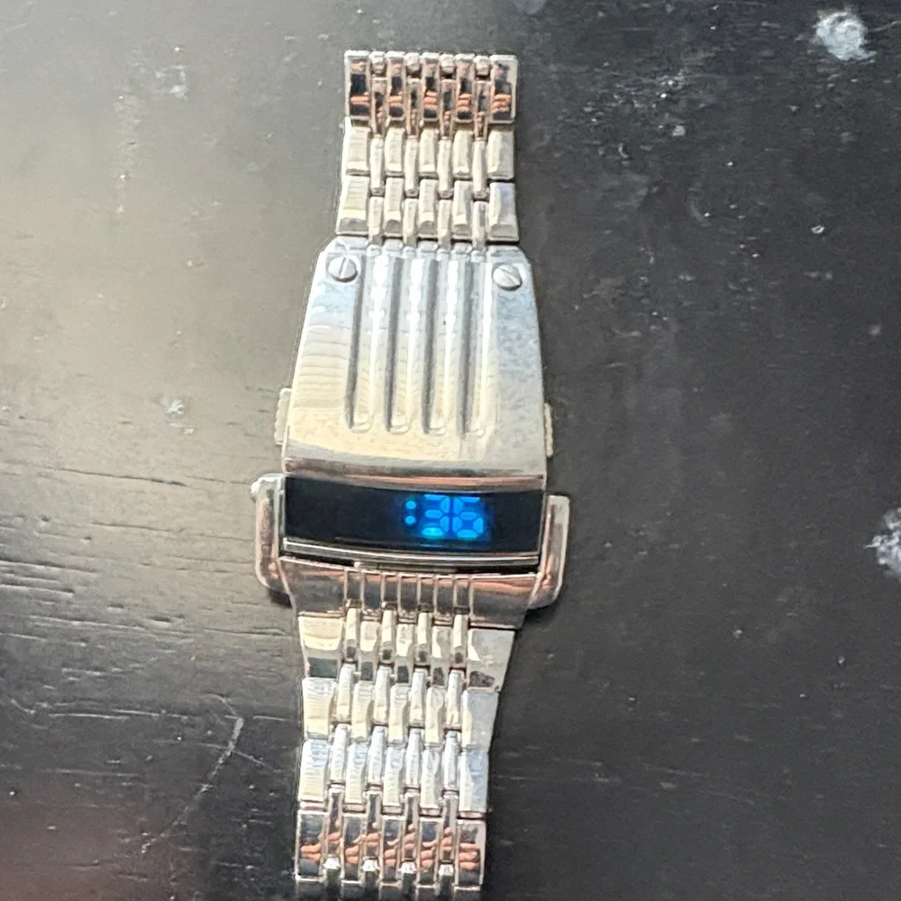 Elegant Silver Smartwatch with Blue Display
